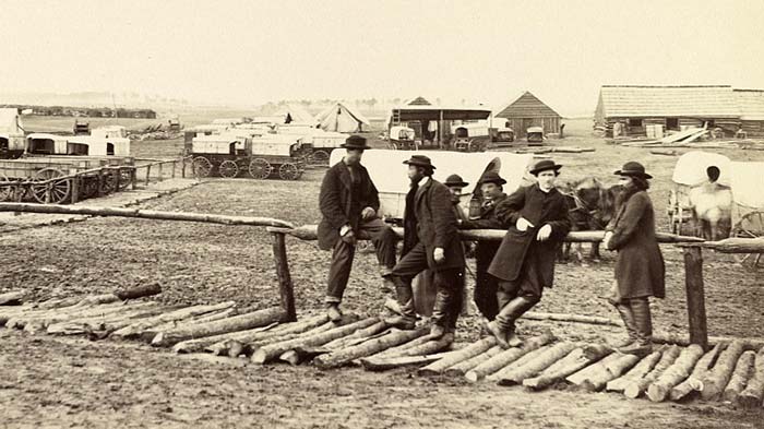 photo of a corduroy walkway in camp