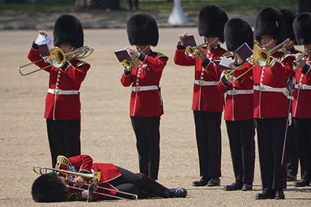 British Band with one member prostrate